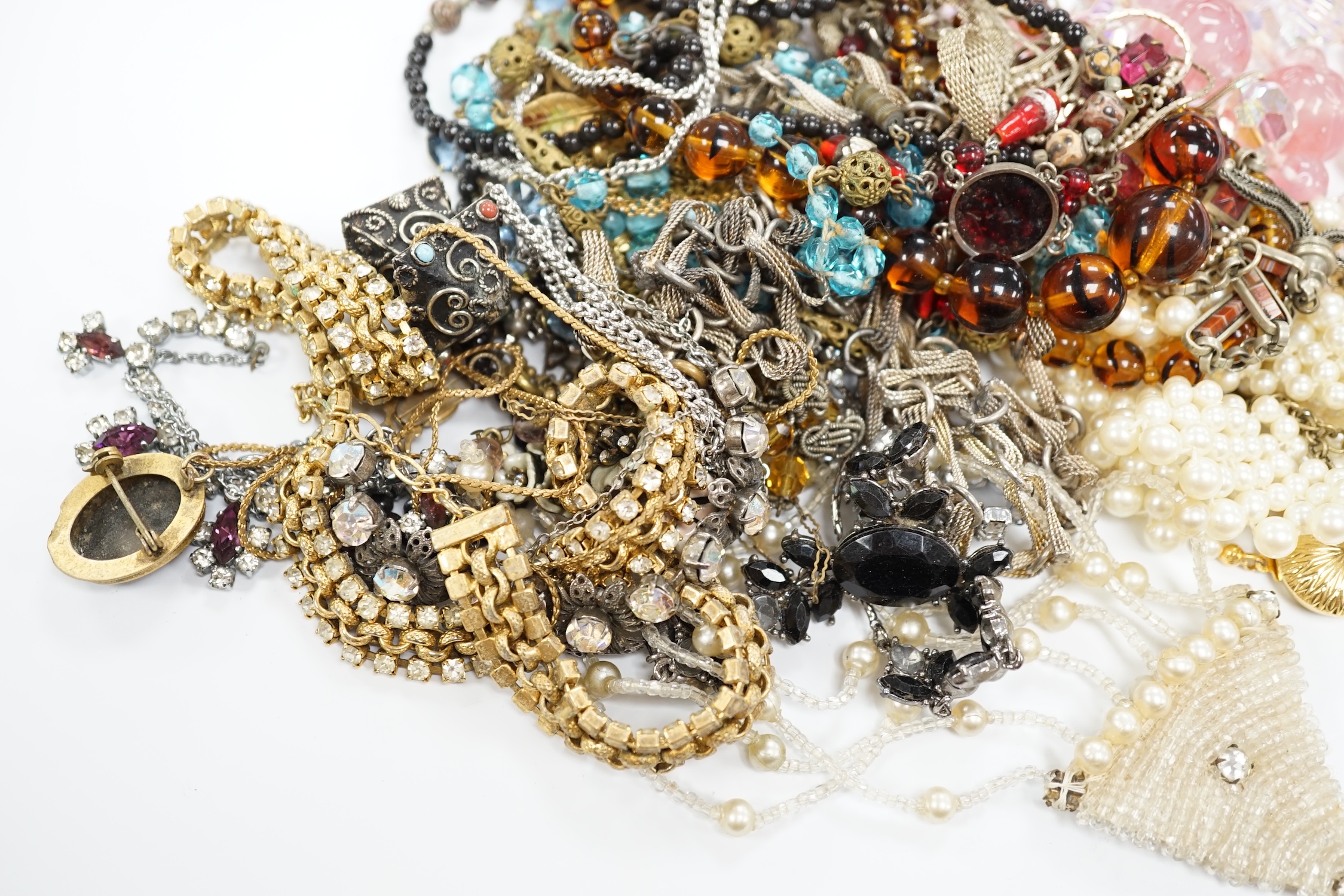 Nine bags of assorted costume jewellery, including bracelets, necklaces, brooches, etc.